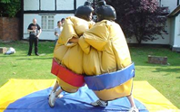 human table football, sumo wrestling and beer keg racing image